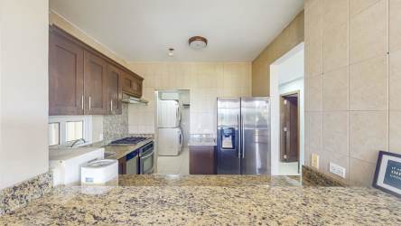 Private terrace overlooking lush golf course at PH Tucan Country Club Panama