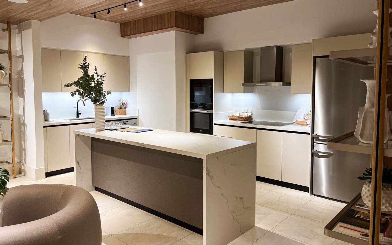 Bright open concept living and kitchen with contemporary finishes in PH The Reserve at Santa Maria Panama