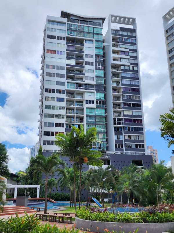 Modern high-rise apartment complex with pool and playground Central Park Tower Panama City
