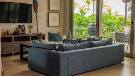 Dining room with slider to sea view terrace in beachfront villa Playa Escondida Panama