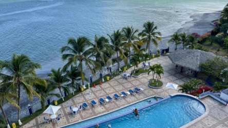 Beachfront high-rise condo tower with tropical landscaping PH Coronado Bay Panama