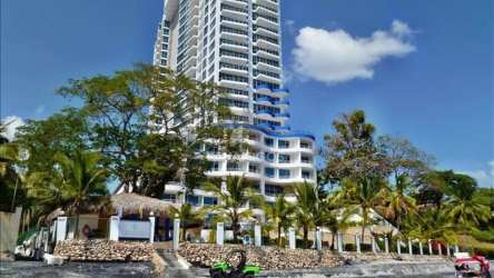 Modern high-rise beachfront condo with wave design balconies at PH Coronado Bay Panama