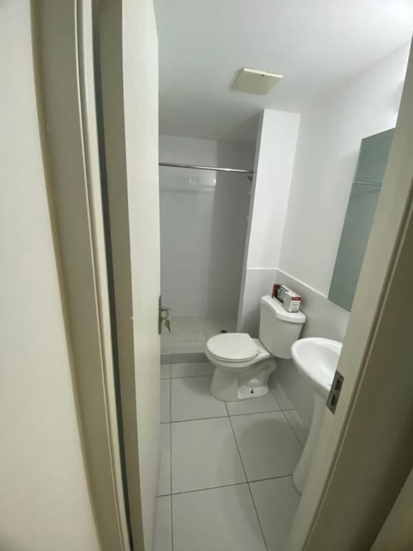 Modern bathroom with pedestal sink and walk-in shower PH ILO Chanis Panama