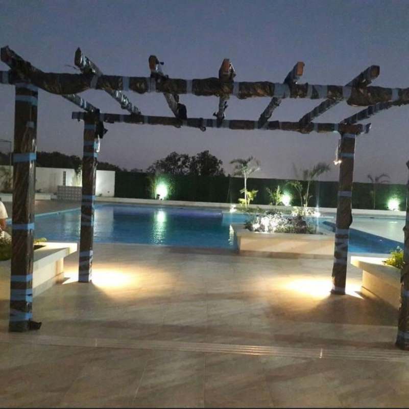 Outdoor pool area night lighting pergola at PH ILO Panama City