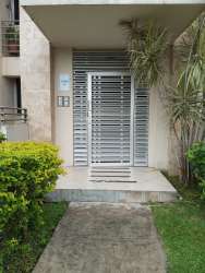 Apartment kitchen with fridge, granite countertops, breakfast bar PH Terrazas del Oeste Panama