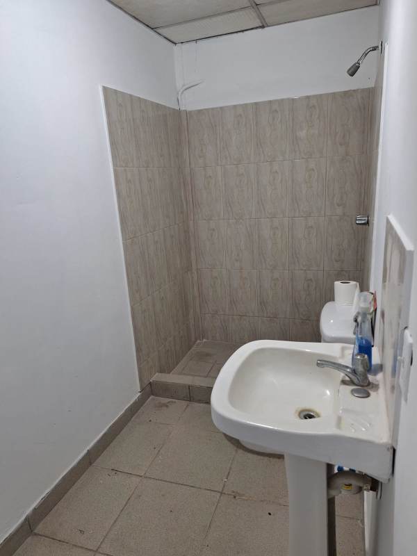 Simple office room tiled floor AC window Ciudad Radial warehouse Panama