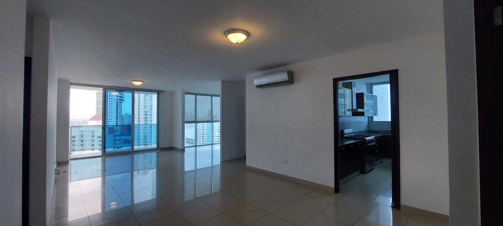 Modern kitchen with granite countertops and cabinetry PH Waterfalls San Francisco Panama