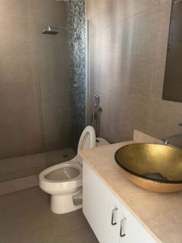 Contemporary bathroom with mosaic tiles vessel sink walk-in shower PH Marfil Obarrio Panama