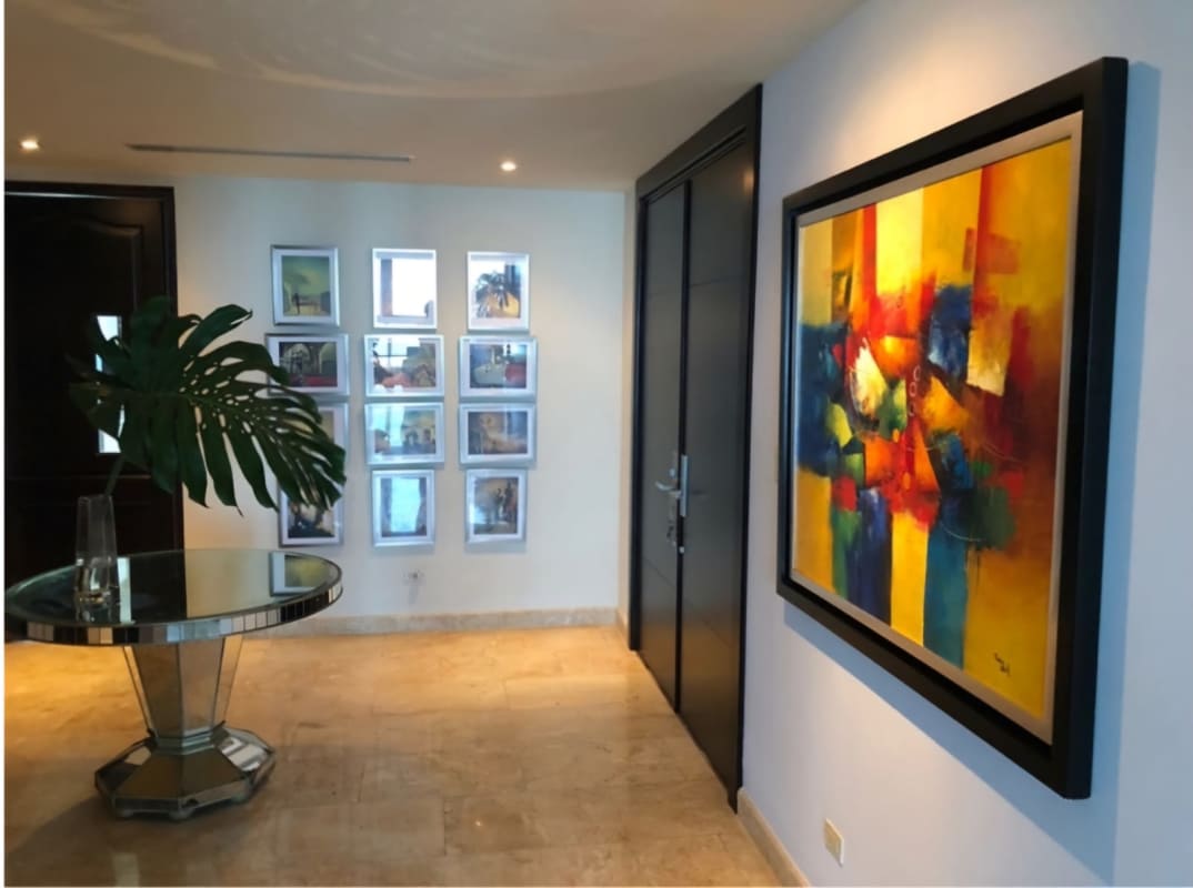 Marble entrance hall with abstract art and decorative accents in PH Torre Zeus Costa del Este Panama