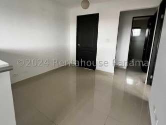 Empty modern minimalist living room tile floors black doors Sunset Hills Costa Verde Panama