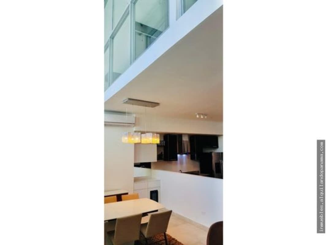 Open dining area with mezzanine and loft features PH Pacific Village Panama Punta Pacifica