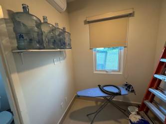 Modern loft with built-in desk and shelving Casamar duplex villa in San Carlos Panama