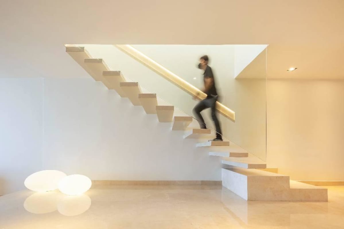 Contemporary two-story oceanfront house with vertical slatted facade, landscaped garden and covered parking Punta Paitilla