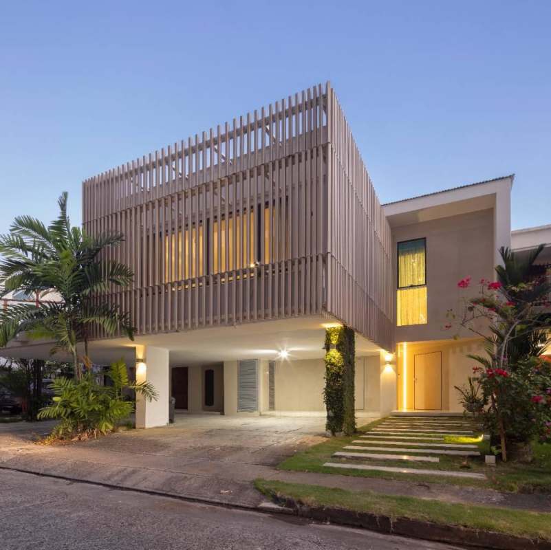 Minimalist staircase with floating steps, glass railing and LED lighting in luxury villa