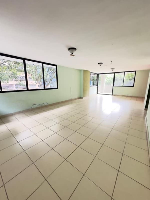 Living and dining space with large windows natural light PH El Carmen Panama City