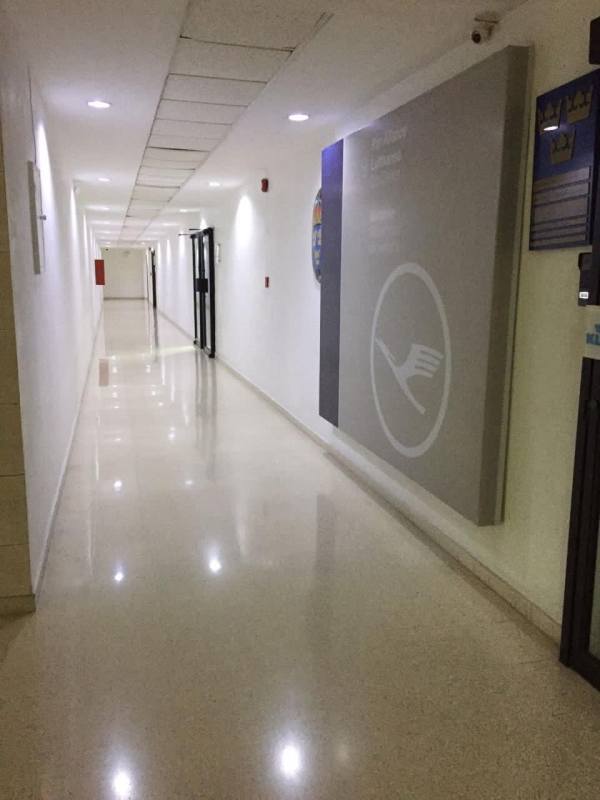 Office area with glass partitions and panoramic windows inside BICSA Financial Tower Panama