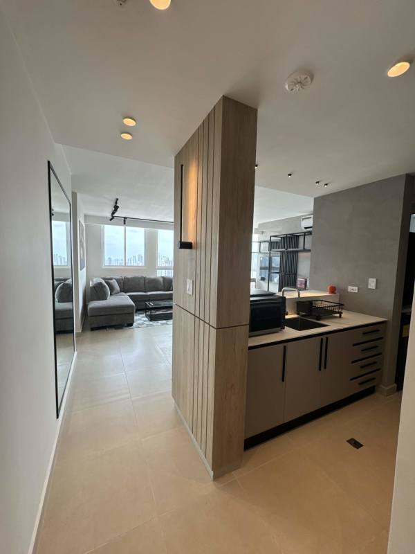 Bright open living and dining area with access to private balcony CenterPoint Tower Panama