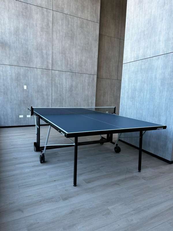 Game lounge featuring ping pong table and lounge area CenterPoint Tower Panama