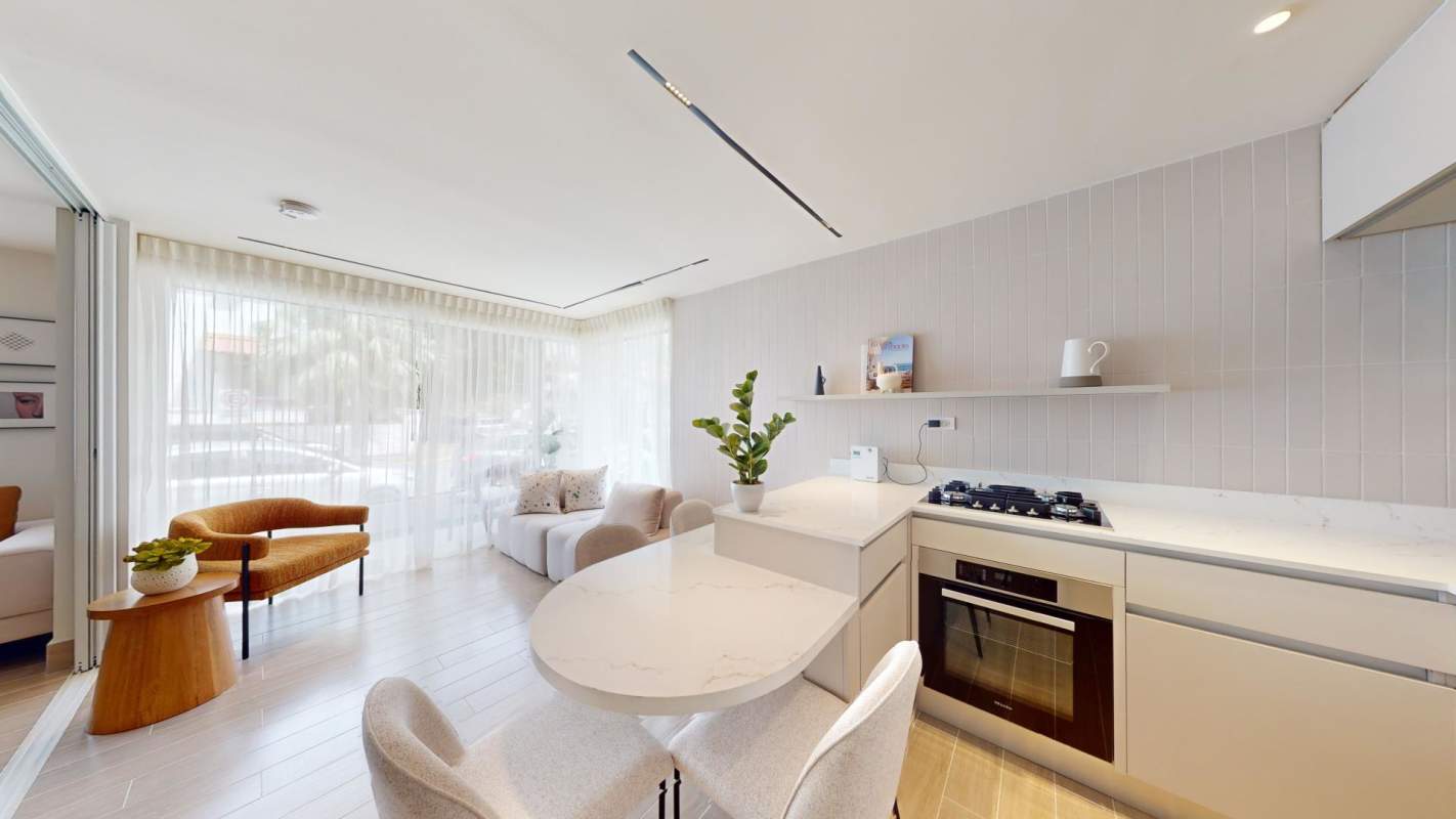Contemporary minimalist kitchen with quartz countertops built-in appliances PH Skyline Plaza Avenida Balboa Panama