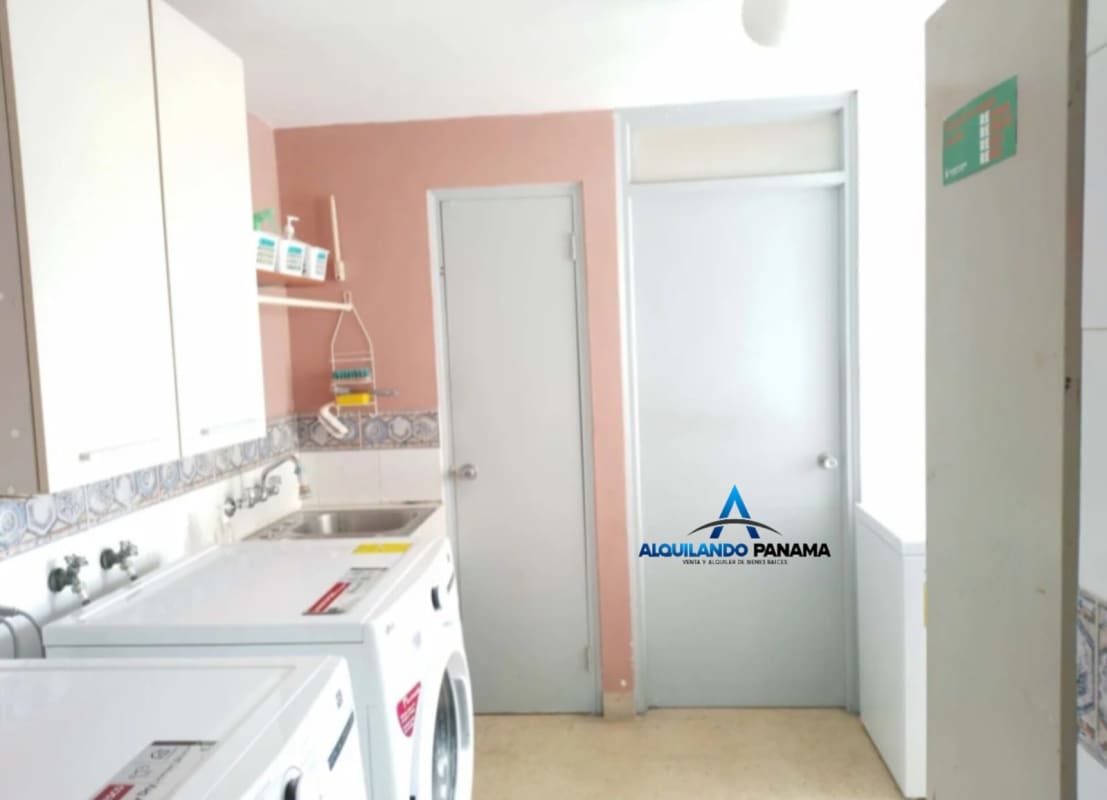 Bright laundry room with washer, dryer and sink PH El Carmen Panama City