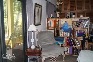 Coastal home kitchen with wood cabinets and stainless appliances Panama