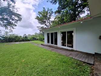 Bedroom with air conditioning and lush garden views Portobelo Panama