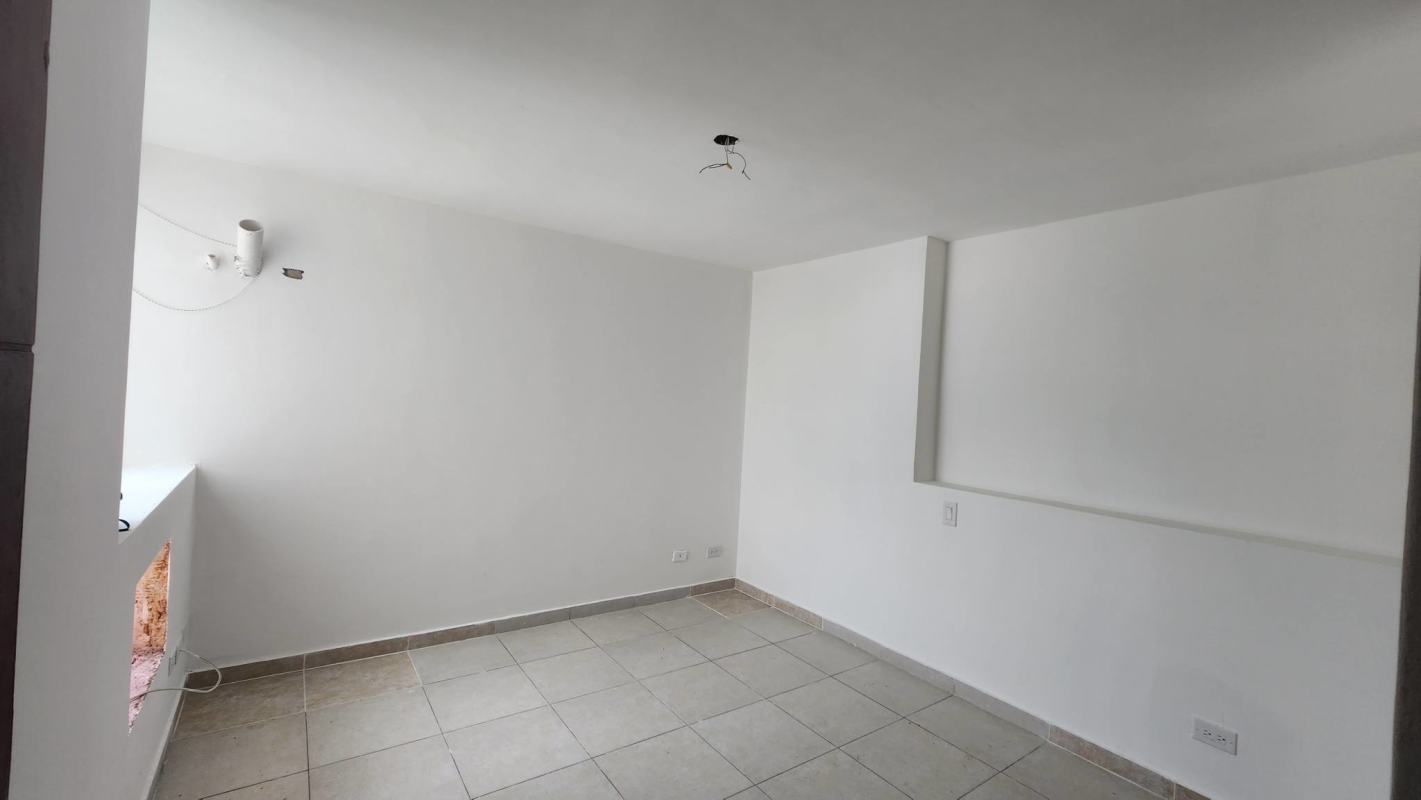 Spacious living room with large windows and balcony in PH Terramar San Francisco Panama