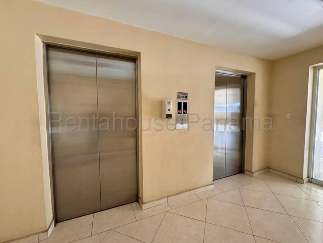 Lobby with elevators in apartment tower PH Torres de Vista Hermosa Panama
