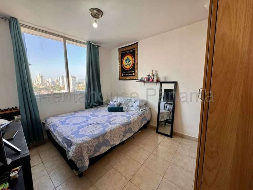 Cozy bedroom with city view window in PH Torres de Vista Hermosa Panama City