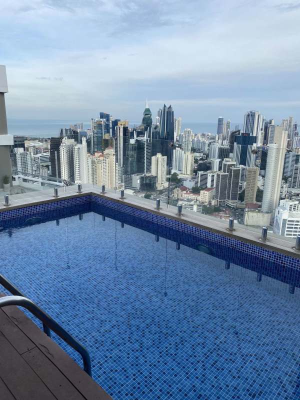 Infinity pool overlooking Panama City skyline rooftop amenity in PH Luxor 300 El Cangrejo