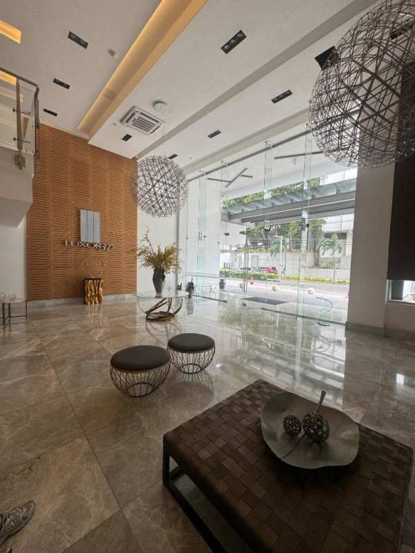 Luxurious lobby with marble floors, artistic lighting, glass walls in PH Luxor 300 El Cangrejo Panama City