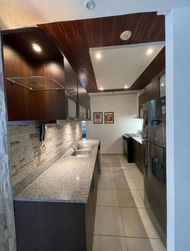 Bathroom featuring glass-enclosed shower, vessel sink, large mirror, modern finishes PH Hato Pintado Plaza Panama City