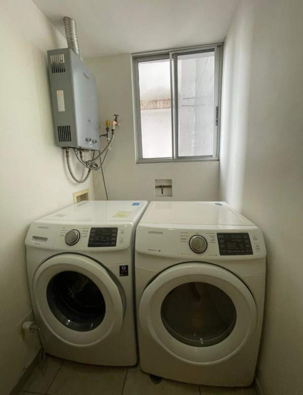 Kitchen with granite countertop, double sink, appliances and tile floor Panama City rental