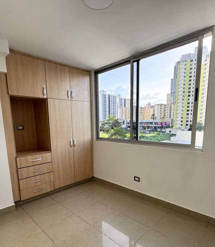 Gated entrance with security booth PH Rokas residential complex Dorado Lake Panama City