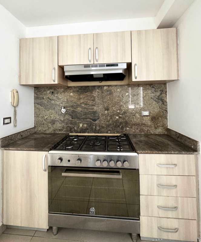 Kitchen with granite countertop, stove, oven PH Rokas Dorado Lake Panama City