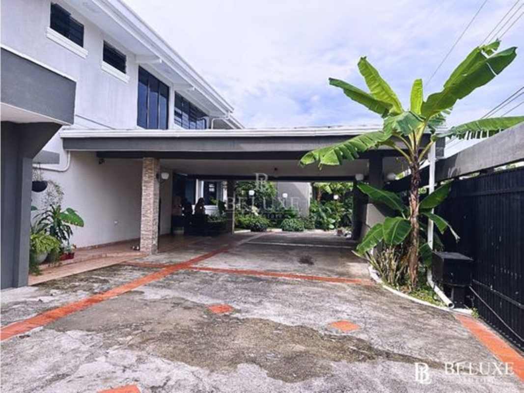 Spacious covered terrace with panoramic view and bar in luxury home Betania Panama