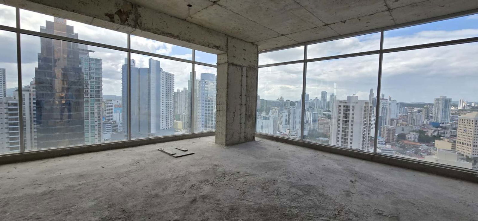 Corner high-rise office with unfinished interior and skyline views in PH Sortis Obarrio Panama City