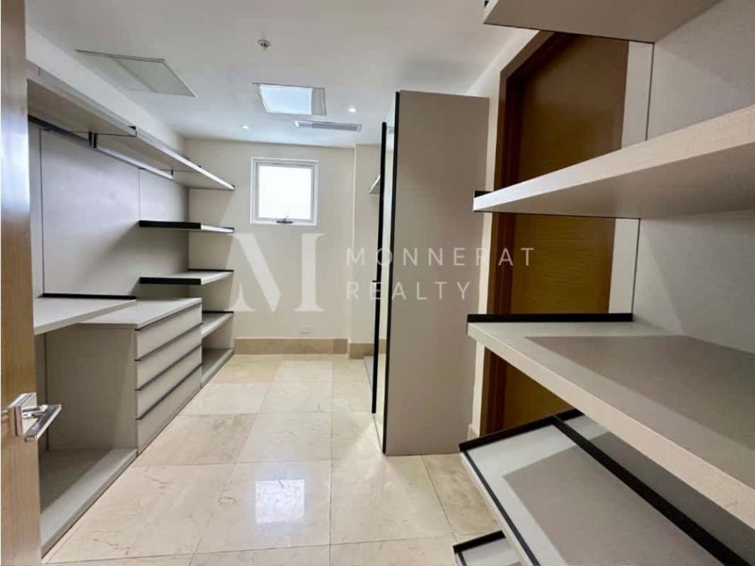 Minimalist bathroom with marble tiles bidet toilet towel rack The Reserve Panama