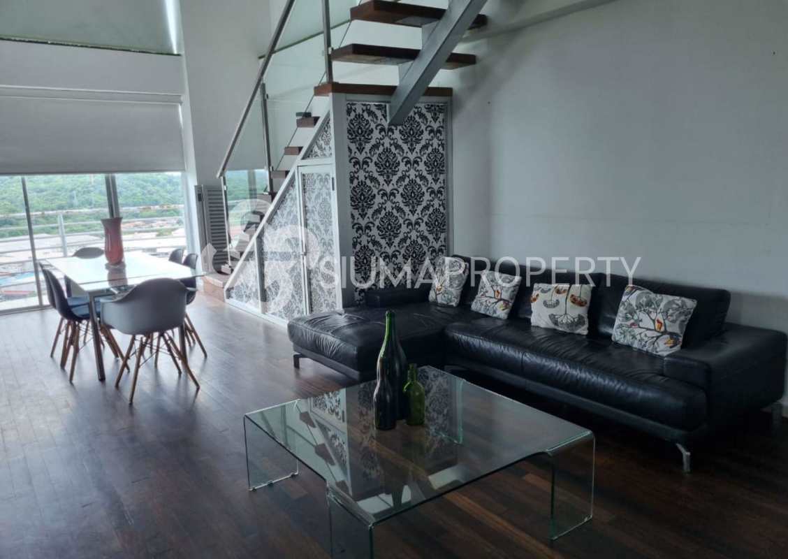 Loft-style living area with floating staircase and mezzanine, PH Vita Bella El Cangrejo Panama