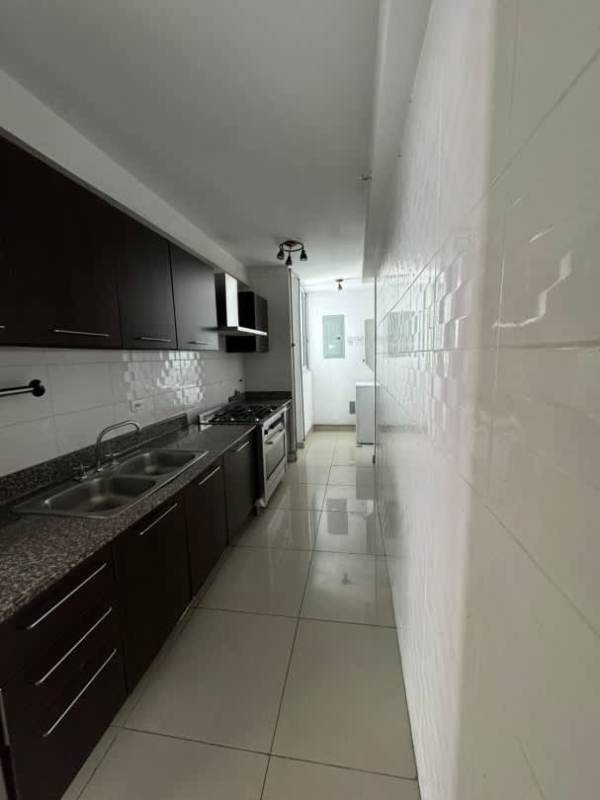 Modern open living dining space with large windows and Panama City skyline view PH Mirador Bella Vista