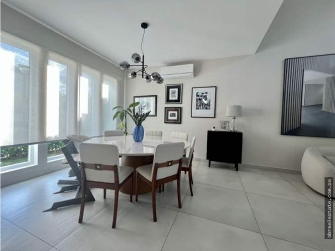 Modern kitchen featuring stainless appliances, sleek cabinetry at The Woods Santa Maria Panama