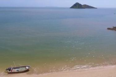 Private coastline with lush tropical greenery and sandy beach land for sale Panama