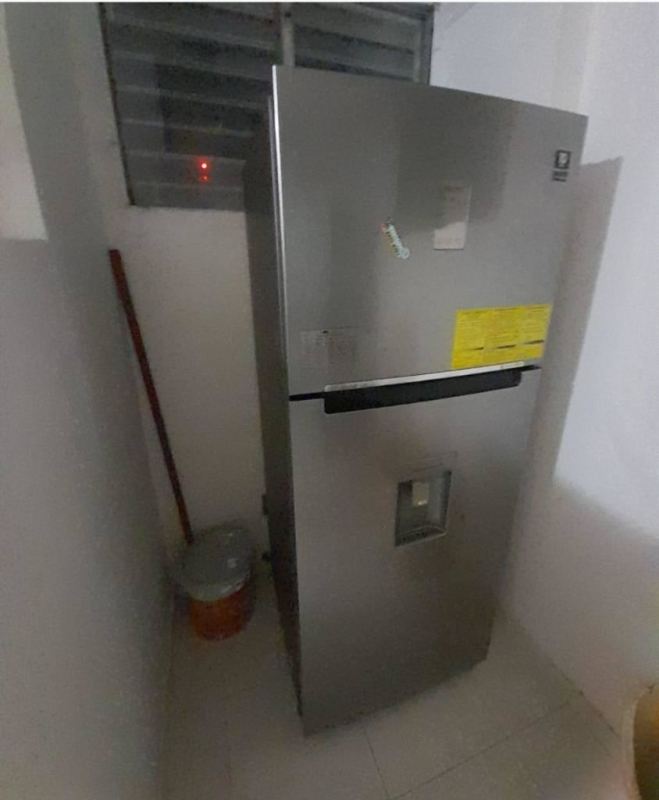 Compact laundry or utility space with window in PH McGregor Hill Condado del Rey Panama