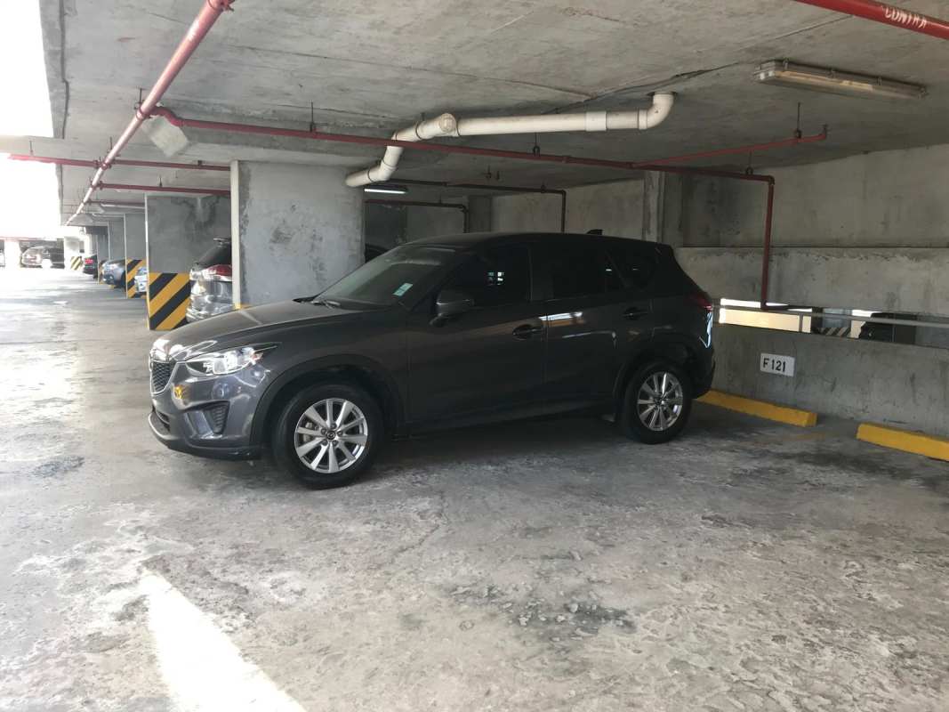 Bright living dining area with tile floors, large windows, AC in San Francisco Bay Panama