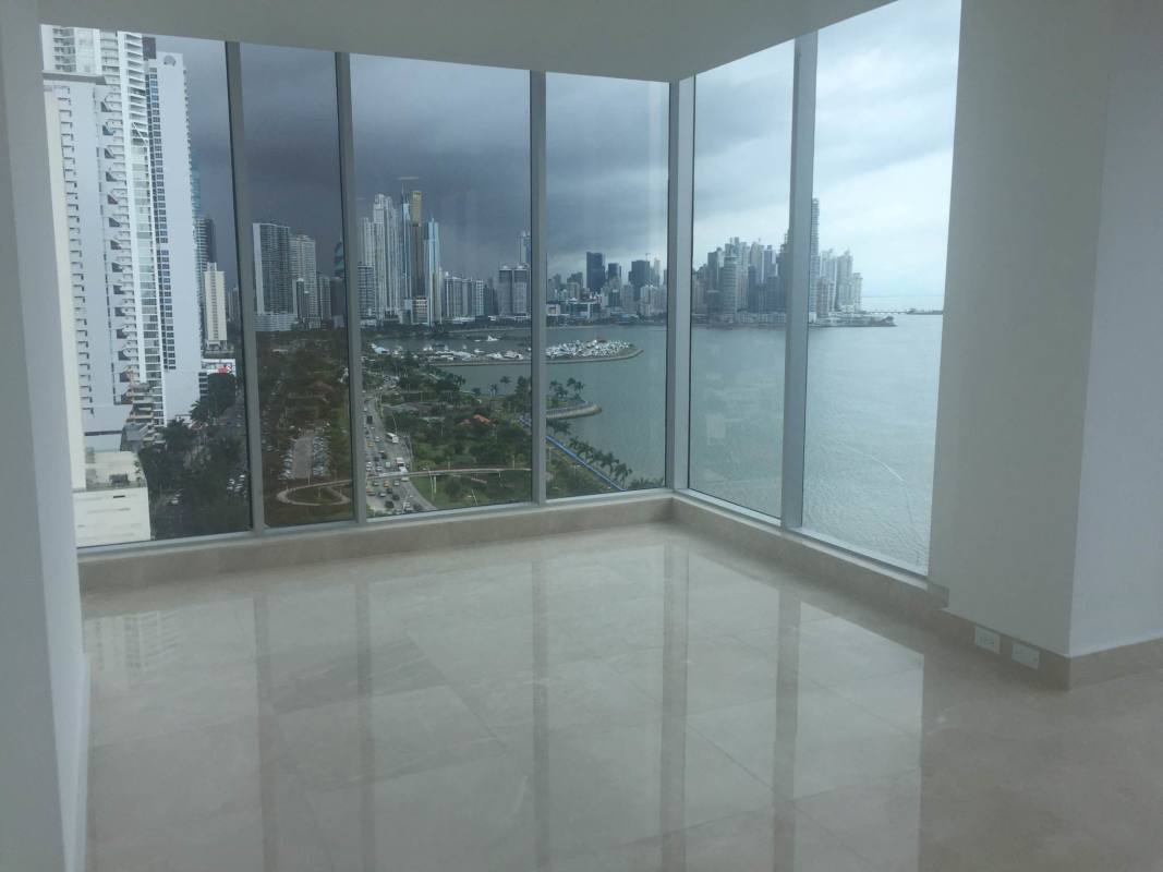 Modern office bathroom with mosaic tile and white sink in PH Balboa Office Center Panama City