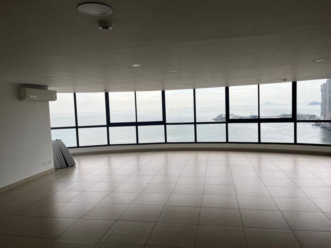 Kitchen with granite counters and wood cabinets PH San Francisco Bay Panama