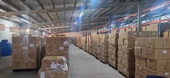 Interior spacious warehouse storage area with shelving units Zona Libre Colon