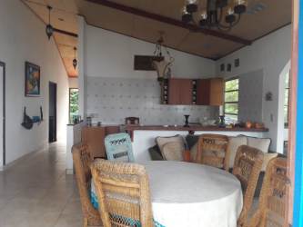 Front view beachfront villa palm trees outdoor spaces La Guaira Portobelo Panama