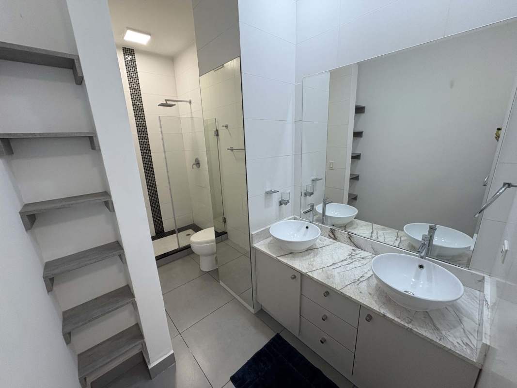 Spacious balcony with glass rail and city ocean skyline views PH Element Panama