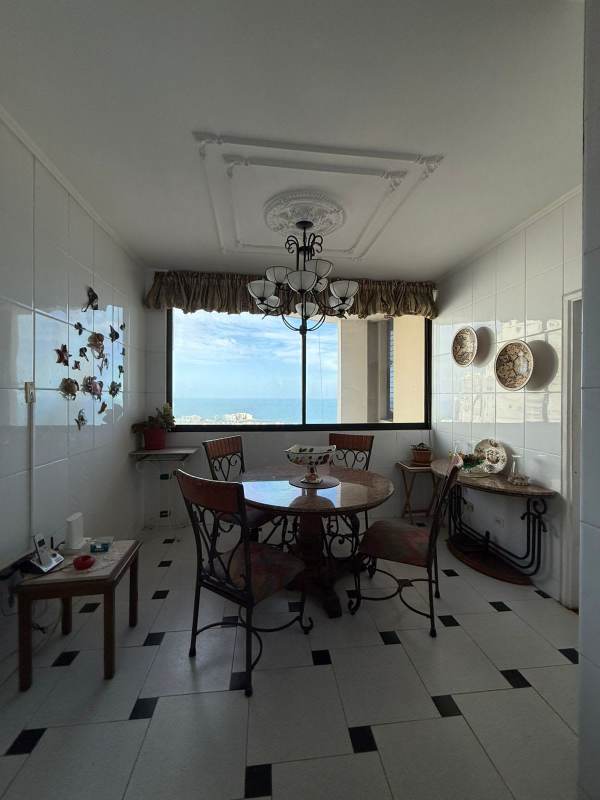 Traditional spacious kitchen white cabinets dining area tiled floors PH Villa Marina Paitilla Panama